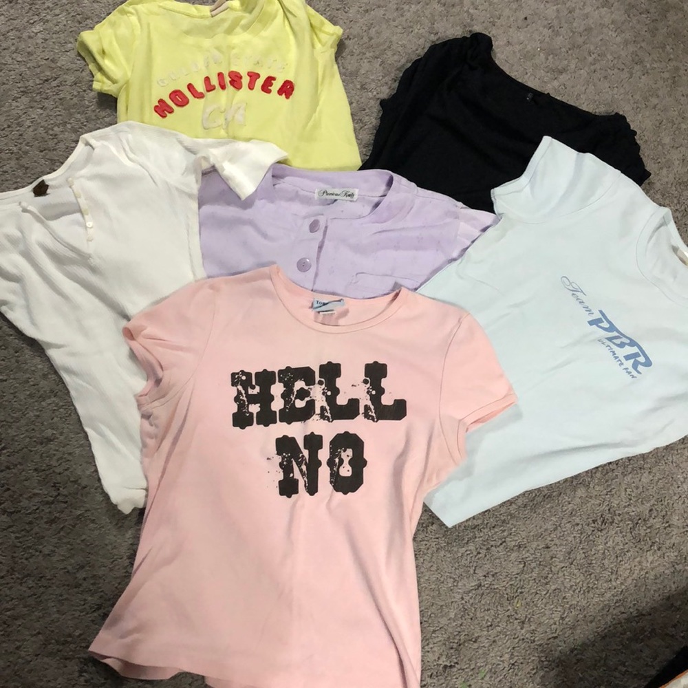 Set of six shirts ranging from medium to large